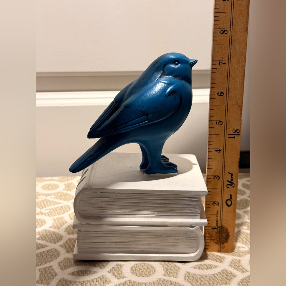 Blue bird figurine bookend on top of books - Picture 2 of 7